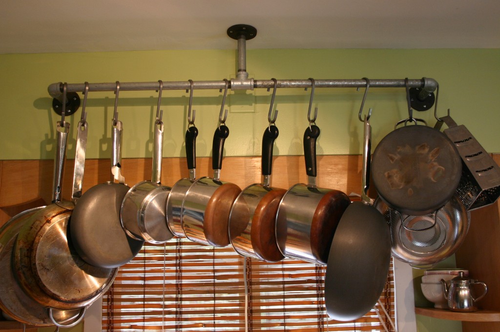 img_2783 After months of searching for pot racks and never finding anything I really liked or could affford - I came up with this solution. Created from pipe parts purchased at Home Depot I designed this pot rack; it has that industrial look that I am drawn to.