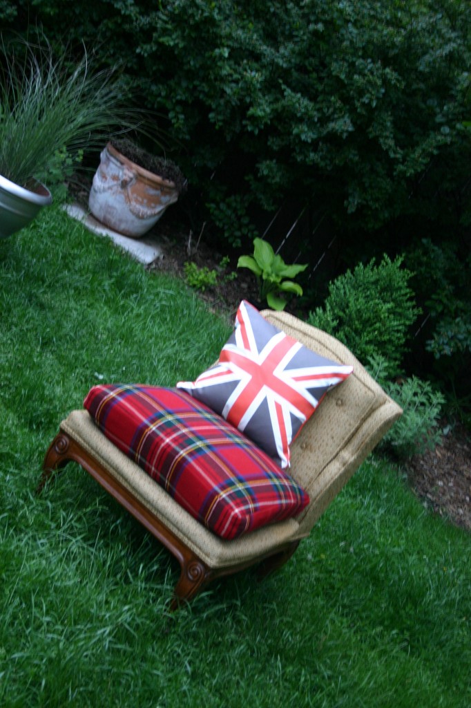 I love tartan plaids, so when I saw this tweed slipper chair at a rummage sale I decided to leave the body as is and just recover the seat cushion. I chose to work with a tartan blanket and add on my favorite Union Jack pillow.