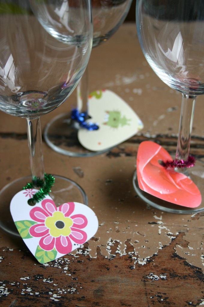 I try to reuse birthday and greeting cards as often as possible - here I used a die cut to punch out heart shapes from a group of old cards. I attached these to the wine glass stems with glitter stick metalic pipe cleaners. Slimply cut pipe cleaners into about 2 inch pieces, slip card on and twist to close.