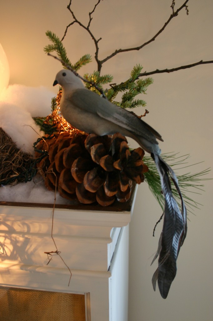 A $4.00 bird ornament from Target and a real bird's nest adds to the story to my winter scene.