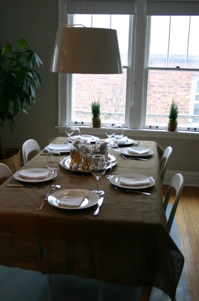 Simple and calm, the table is ready for an enjoyable meal with family.