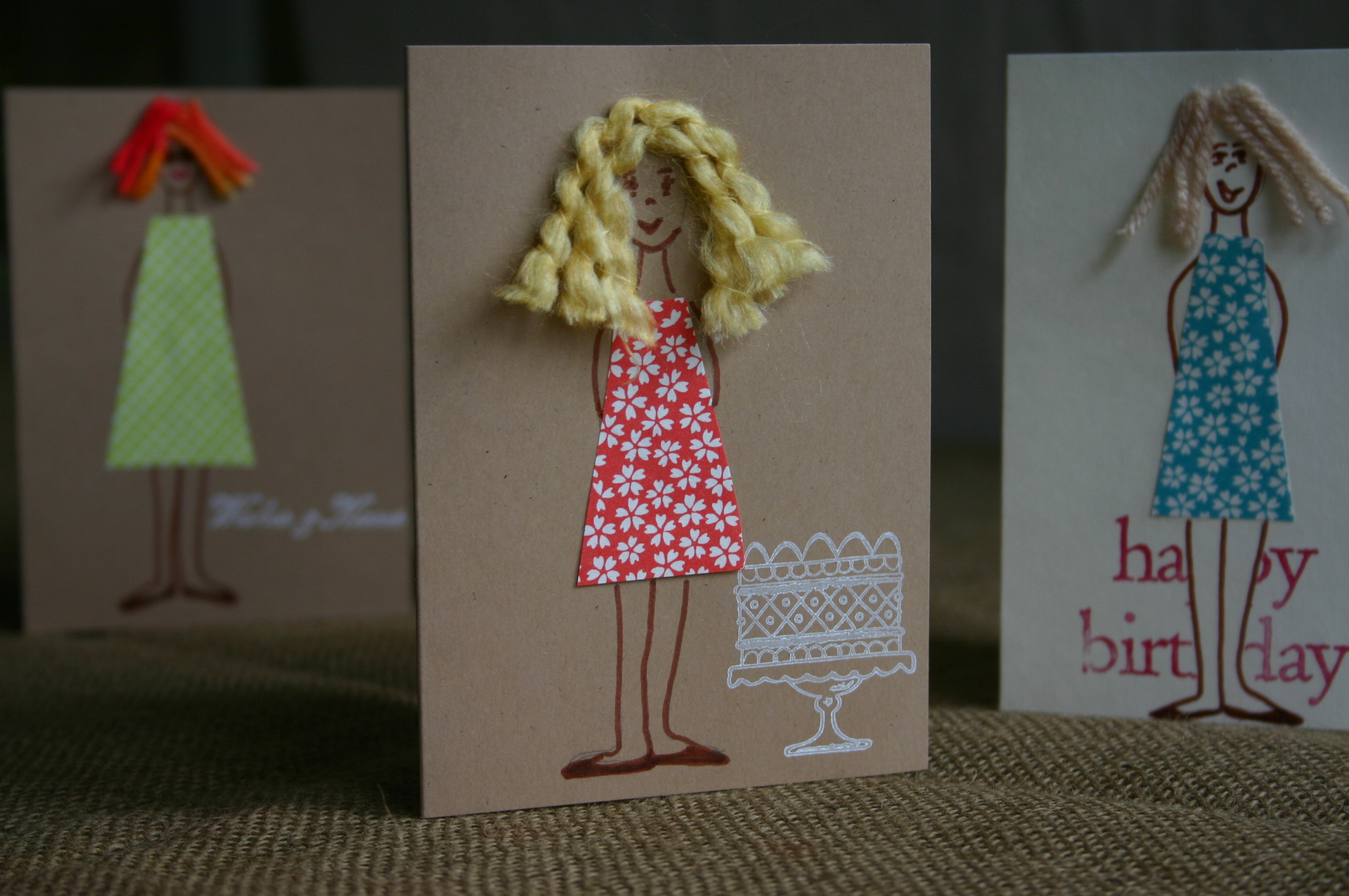 IMG_7616 Use left over yarn and wrapping paper or origami paper to make these simple cards.