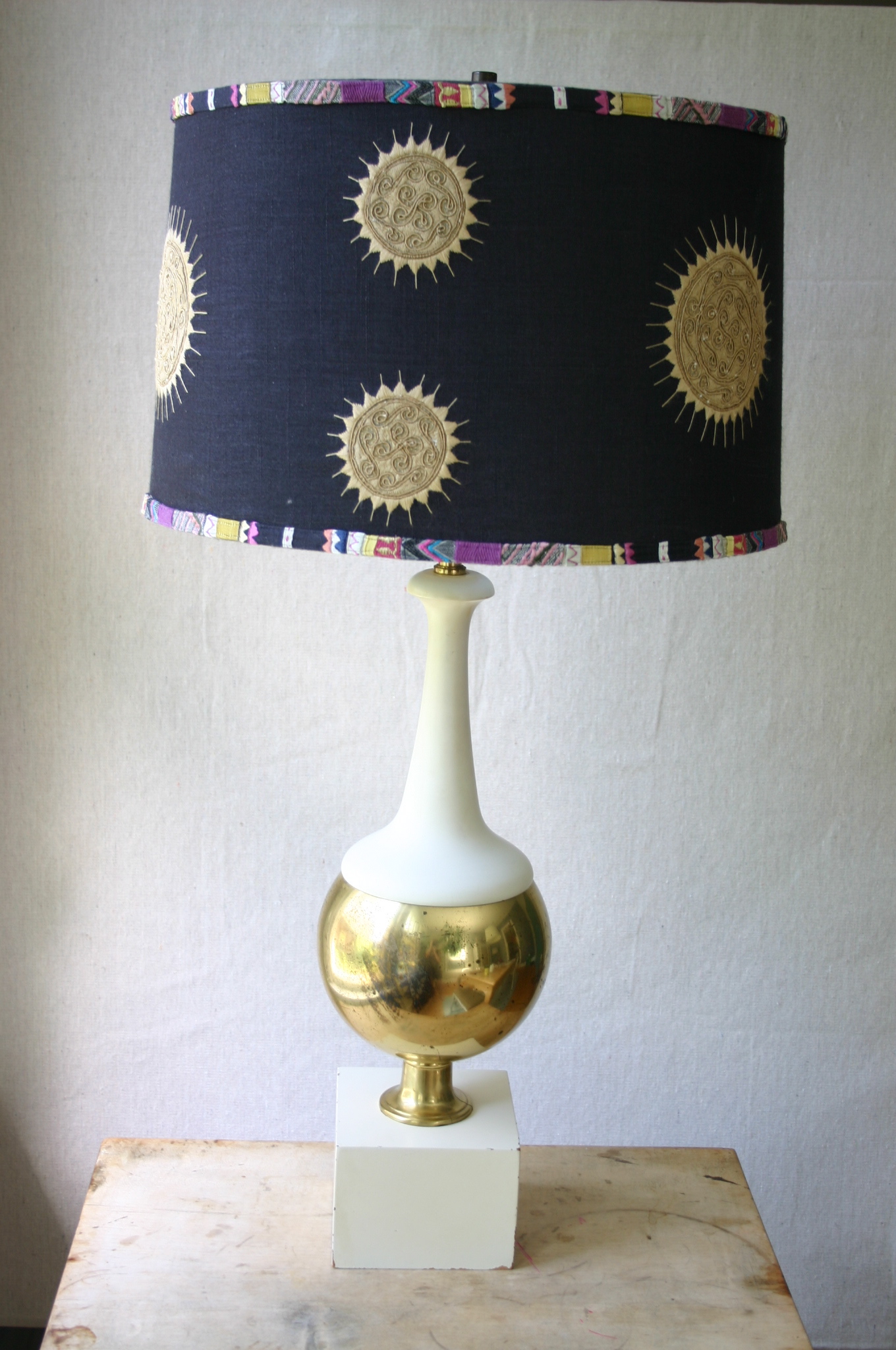 IMG_3199 I picked up this lamp base for $7.00 at a local thrift store. Because I spent so little on it, I didn't mind splurging on the shade. Luckily, I found this great looking shade at Anthropolgie - on sale for $70.00. I love the combination of clean smooth lines with ethnic prints.
