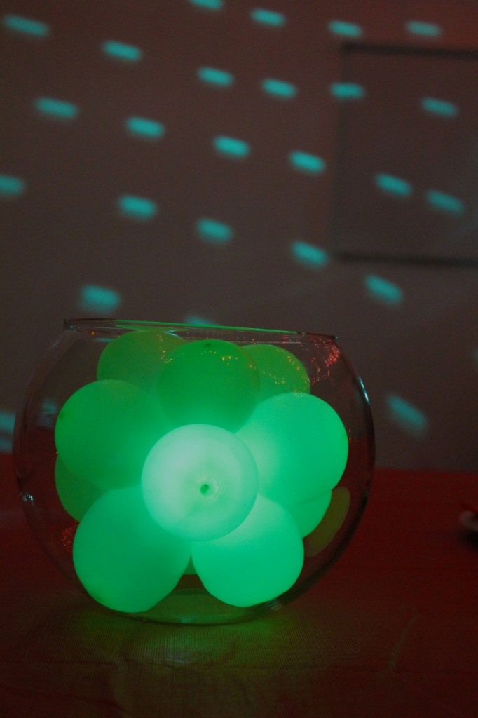 family chic glowing balloon centerpiece