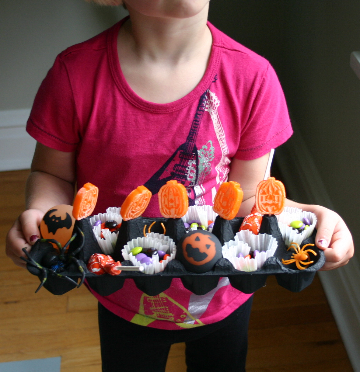 For Halloween fun, try making an egg carton candy tray. Family Chic